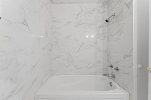79 Fonda Drive Se, Calgary, AB - Indoor Photo Showing Bathroom