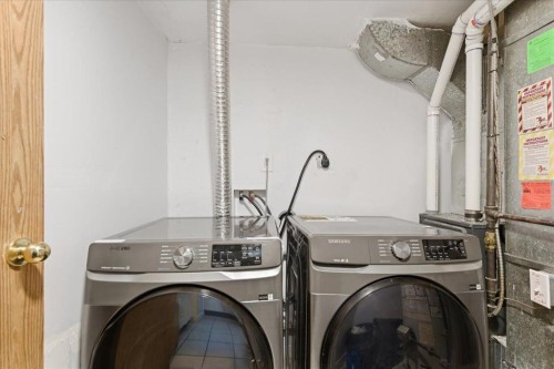79 Fonda Drive Se, Calgary, AB - Indoor Photo Showing Laundry Room