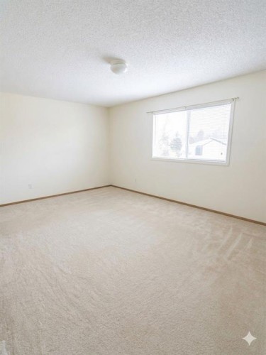 746 Martindale Boulevard Ne, Calgary, AB - Indoor Photo Showing Other Room