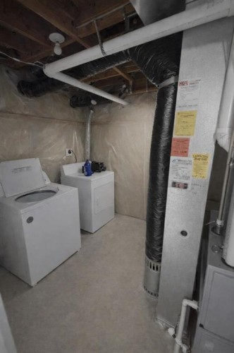 746 Martindale Boulevard Ne, Calgary, AB - Indoor Photo Showing Laundry Room