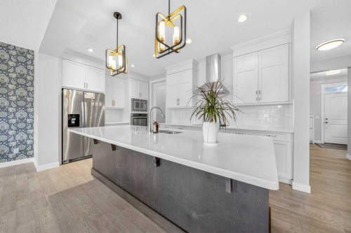234 West Grove Point Sw, Calgary, AB - Indoor Photo Showing Kitchen With Upgraded Kitchen