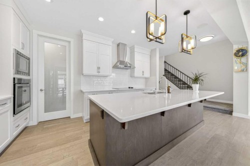 234 West Grove Point Sw, Calgary, AB - Indoor Photo Showing Kitchen With Upgraded Kitchen