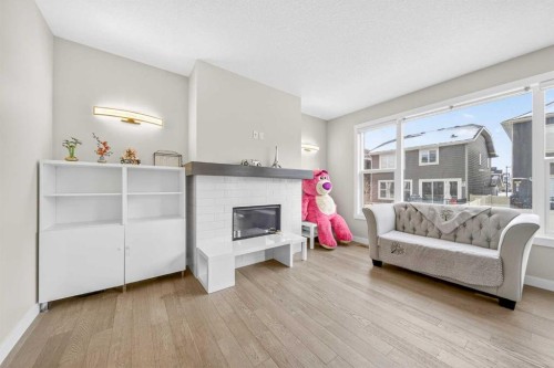 234 West Grove Point Sw, Calgary, AB - Indoor With Fireplace
