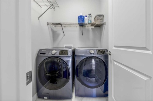 234 West Grove Point Sw, Calgary, AB - Indoor Photo Showing Laundry Room