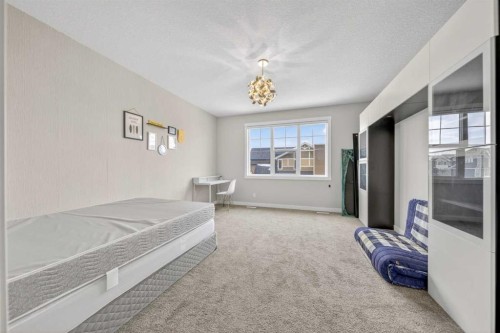 234 West Grove Point Sw, Calgary, AB - Indoor Photo Showing Bedroom