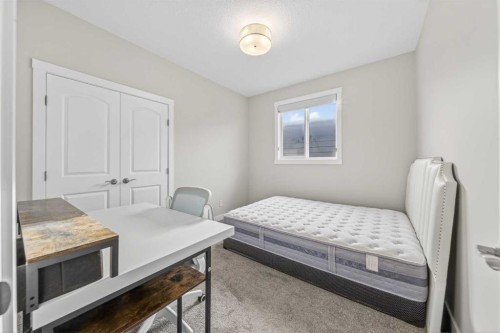 234 West Grove Point Sw, Calgary, AB - Indoor Photo Showing Bedroom
