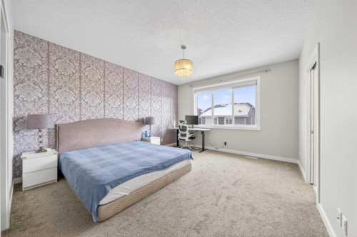 234 West Grove Point Sw, Calgary, AB - Indoor Photo Showing Bedroom