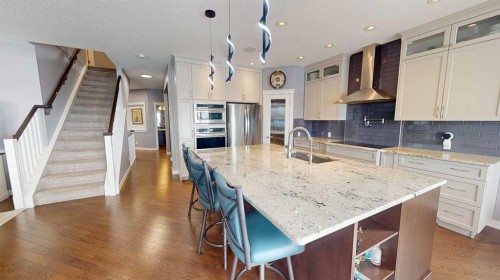 158 Ranch Road, Okotoks, AB - Indoor Photo Showing Kitchen With Upgraded Kitchen