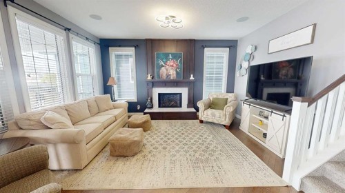 158 Ranch Road, Okotoks, AB - Indoor Photo Showing Living Room With Fireplace