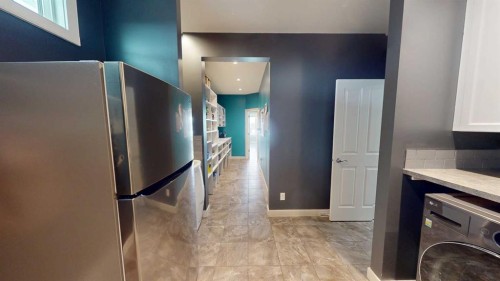 158 Ranch Road, Okotoks, AB - Indoor Photo Showing Laundry Room