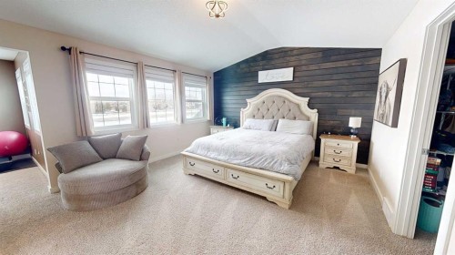 158 Ranch Road, Okotoks, AB - Indoor Photo Showing Bedroom