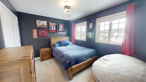 158 Ranch Road, Okotoks, AB - Indoor Photo Showing Bedroom