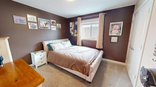 158 Ranch Road, Okotoks, AB - Indoor Photo Showing Bedroom