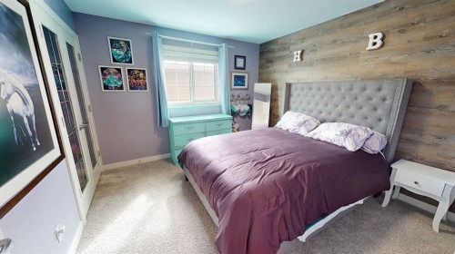 158 Ranch Road, Okotoks, AB - Indoor Photo Showing Bedroom