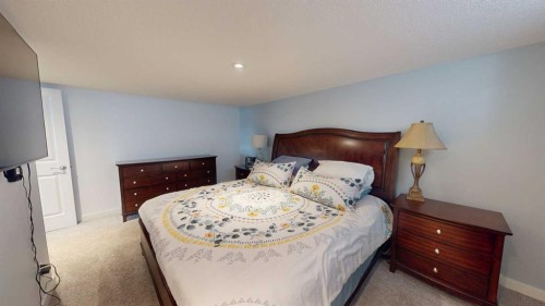 158 Ranch Road, Okotoks, AB - Indoor Photo Showing Bedroom
