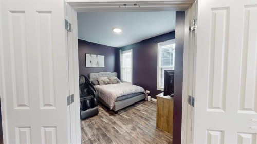 158 Ranch Road, Okotoks, AB - Indoor Photo Showing Bedroom