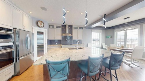158 Ranch Road, Okotoks, AB - Indoor Photo Showing Kitchen With Upgraded Kitchen