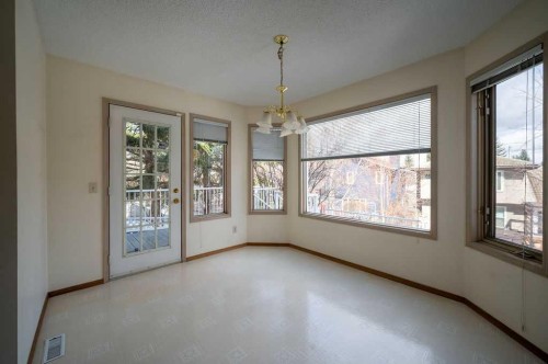 207 Shawnee Mews Sw, Calgary, AB - Indoor Photo Showing Other Room