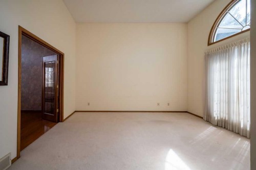 207 Shawnee Mews Sw, Calgary, AB - Indoor Photo Showing Other Room