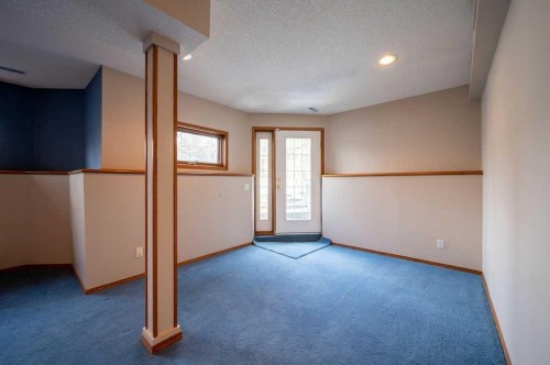 207 Shawnee Mews Sw, Calgary, AB - Indoor Photo Showing Other Room