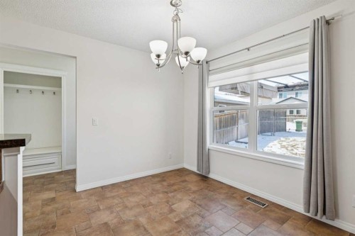 200 Silverado Drive Sw, Calgary, AB - Indoor Photo Showing Other Room