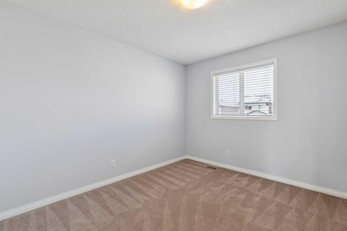 200 Silverado Drive Sw, Calgary, AB - Indoor Photo Showing Other Room
