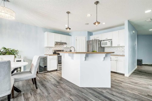 94 New Brighton Circle Se, Calgary, AB - Indoor Photo Showing Kitchen With Upgraded Kitchen