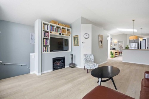 89 Prestwick Way Se, Calgary, AB - Indoor Photo Showing Living Room With Fireplace