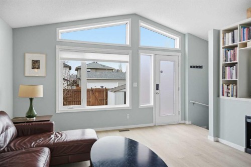 89 Prestwick Way Se, Calgary, AB - Indoor Photo Showing Living Room With Fireplace