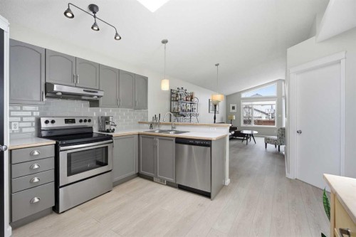 89 Prestwick Way Se, Calgary, AB - Indoor Photo Showing Kitchen With Stainless Steel Kitchen With Double Sink