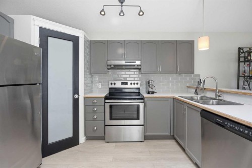 89 Prestwick Way Se, Calgary, AB - Indoor Photo Showing Kitchen With Stainless Steel Kitchen With Double Sink With Upgraded Kitchen