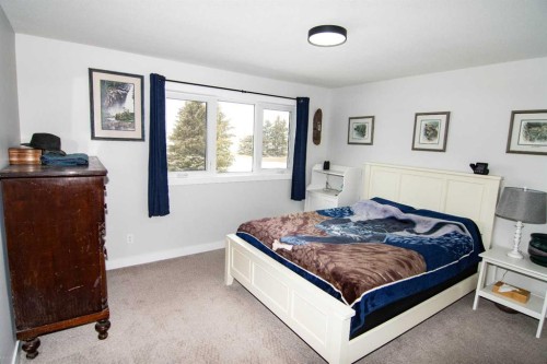 33233 Range Road 284, Rural Mountain View County, AB - Indoor Photo Showing Bedroom