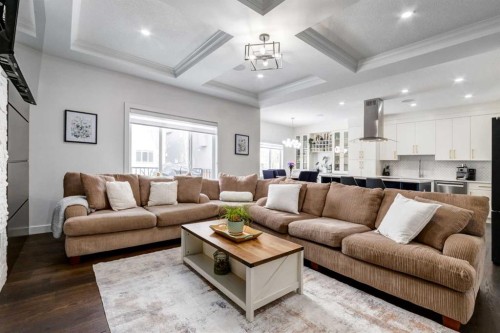305 Kinniburgh Cove, Chestermere, AB - Indoor Photo Showing Living Room