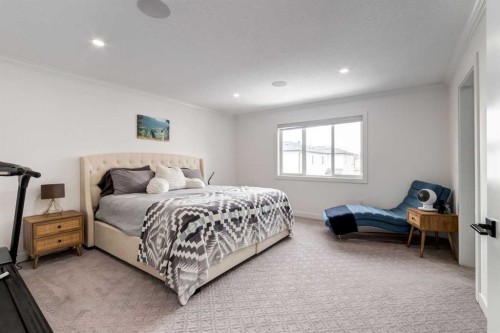 305 Kinniburgh Cove, Chestermere, AB - Indoor Photo Showing Bedroom