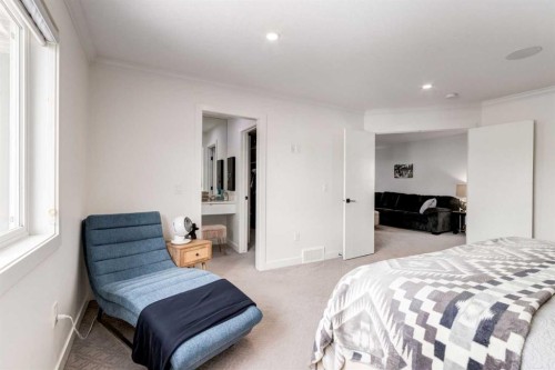 305 Kinniburgh Cove, Chestermere, AB - Indoor Photo Showing Bedroom