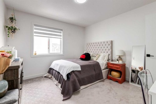 305 Kinniburgh Cove, Chestermere, AB - Indoor Photo Showing Bedroom