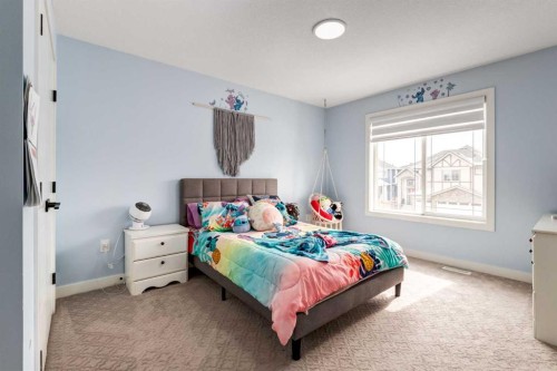 305 Kinniburgh Cove, Chestermere, AB - Indoor Photo Showing Bedroom