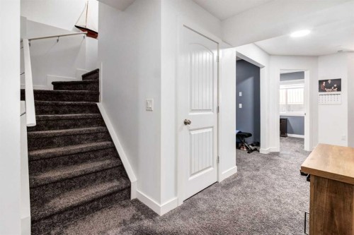 305 Kinniburgh Cove, Chestermere, AB - Indoor Photo Showing Other Room