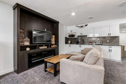 305 Kinniburgh Cove, Chestermere, AB - Indoor Photo Showing Other Room