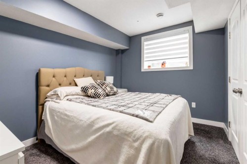 305 Kinniburgh Cove, Chestermere, AB - Indoor Photo Showing Bedroom