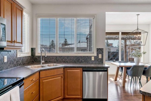 87 Prestwick Close Se, Calgary, AB - Indoor Photo Showing Kitchen With Double Sink