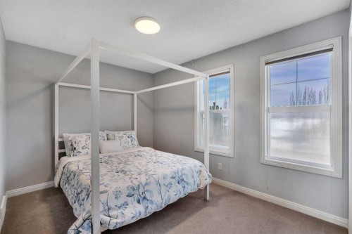 87 Prestwick Close Se, Calgary, AB - Indoor Photo Showing Bedroom