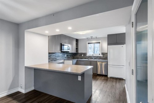 92 Riverbrook Place Se, Calgary, AB - Indoor Photo Showing Kitchen With Double Sink