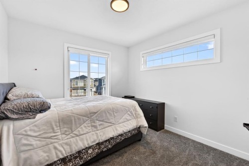 208 Dawson Circle, Chestermere, AB - Indoor Photo Showing Bedroom