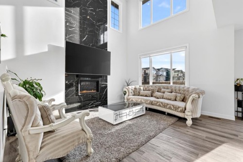 208 Dawson Circle, Chestermere, AB - Indoor Photo Showing Living Room With Fireplace