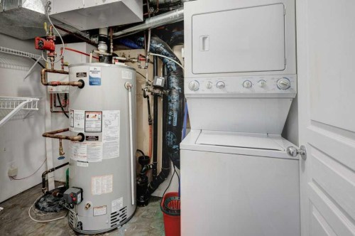 703 52 Avenue Sw, Calgary, AB - Indoor Photo Showing Laundry Room