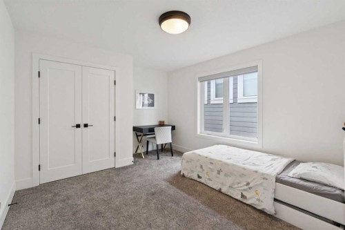 143 Aspen Summit Boulevard Sw, Calgary, AB - Indoor Photo Showing Bedroom