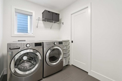 143 Aspen Summit Boulevard Sw, Calgary, AB - Indoor Photo Showing Laundry Room