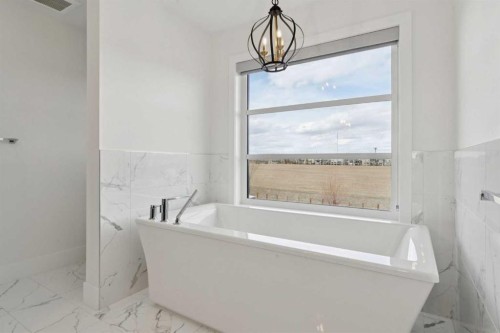 143 Aspen Summit Boulevard Sw, Calgary, AB - Indoor Photo Showing Bathroom