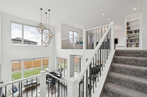 143 Aspen Summit Boulevard Sw, Calgary, AB - Indoor Photo Showing Other Room